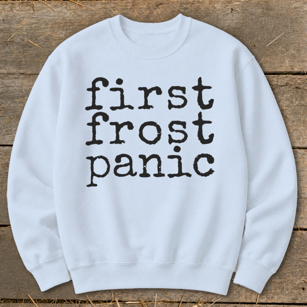 Light blue sweatshirt with "first frost panic" text in black typewriter font.
