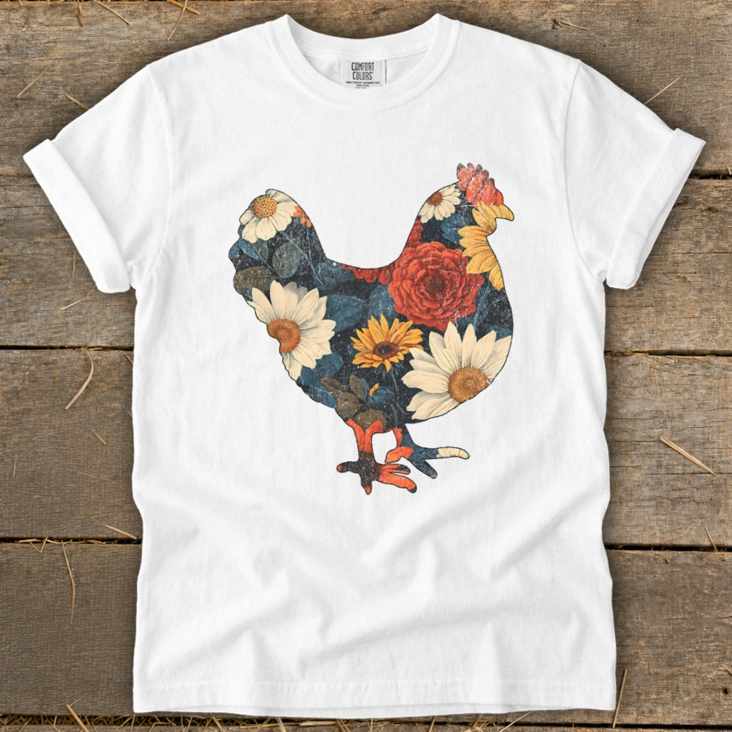 White t-shirt with a floral chicken design featuring daisies and roses.