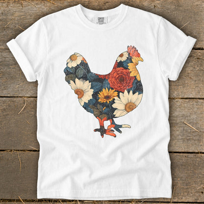 White t-shirt with a floral chicken design featuring daisies and roses.