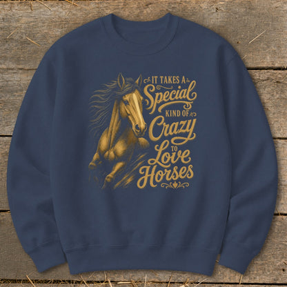 Navy sweatshirt with gold text and a galloping horse graphic.