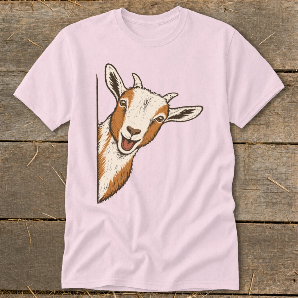 Pink t-shirt with a peeking goat illustration with brown and white fur.
