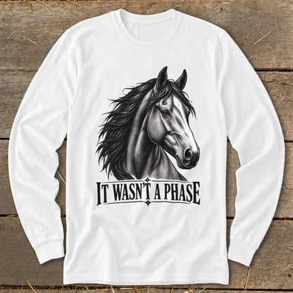 White long-sleeve shirt with a black and white horse graphic and text "IT WASN'T A PHASE".