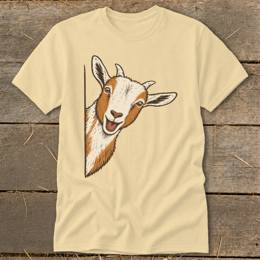 Light yellow t-shirt with a happy goat peeking from the side.