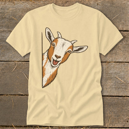 Light yellow t-shirt with a happy goat peeking from the side.