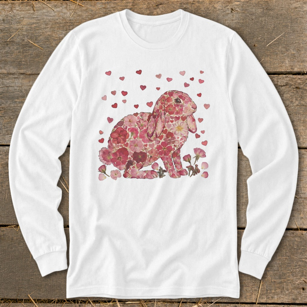 White long-sleeve shirt with a pink floral bunny and scattered hearts design.