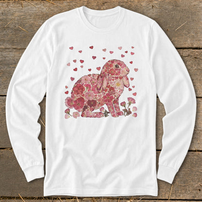 White long-sleeve shirt with a pink floral bunny and scattered hearts design.