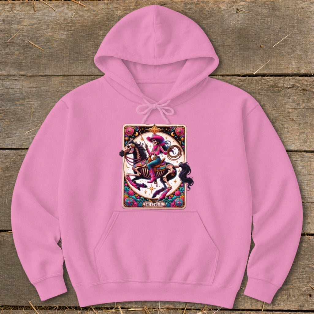 Pink hoodie with a "The Cowgirl" tarot card graphic featuring a skeleton riding a horse.