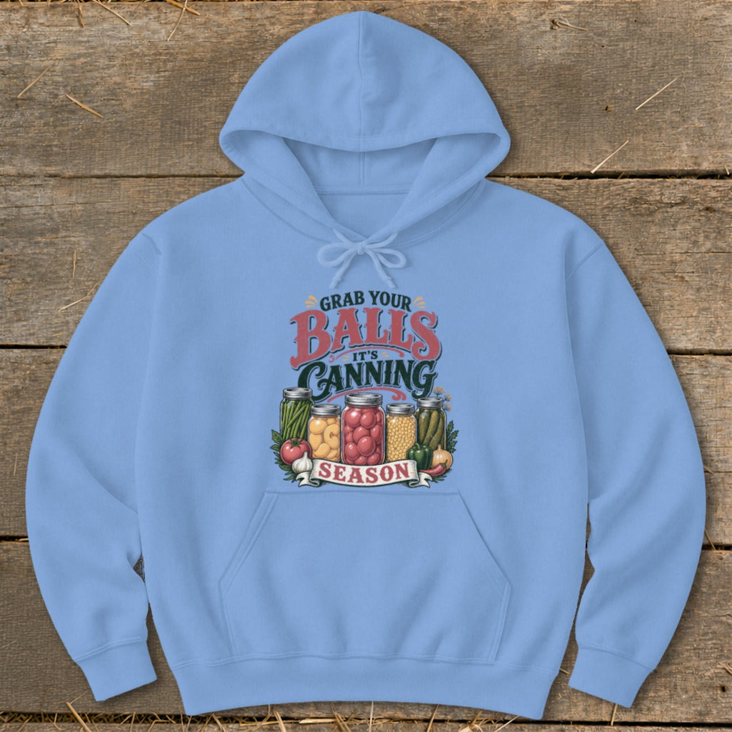 Light blue hoodie with "Grab Your Balls It's Canning Season" graphic and jars of vegetables.