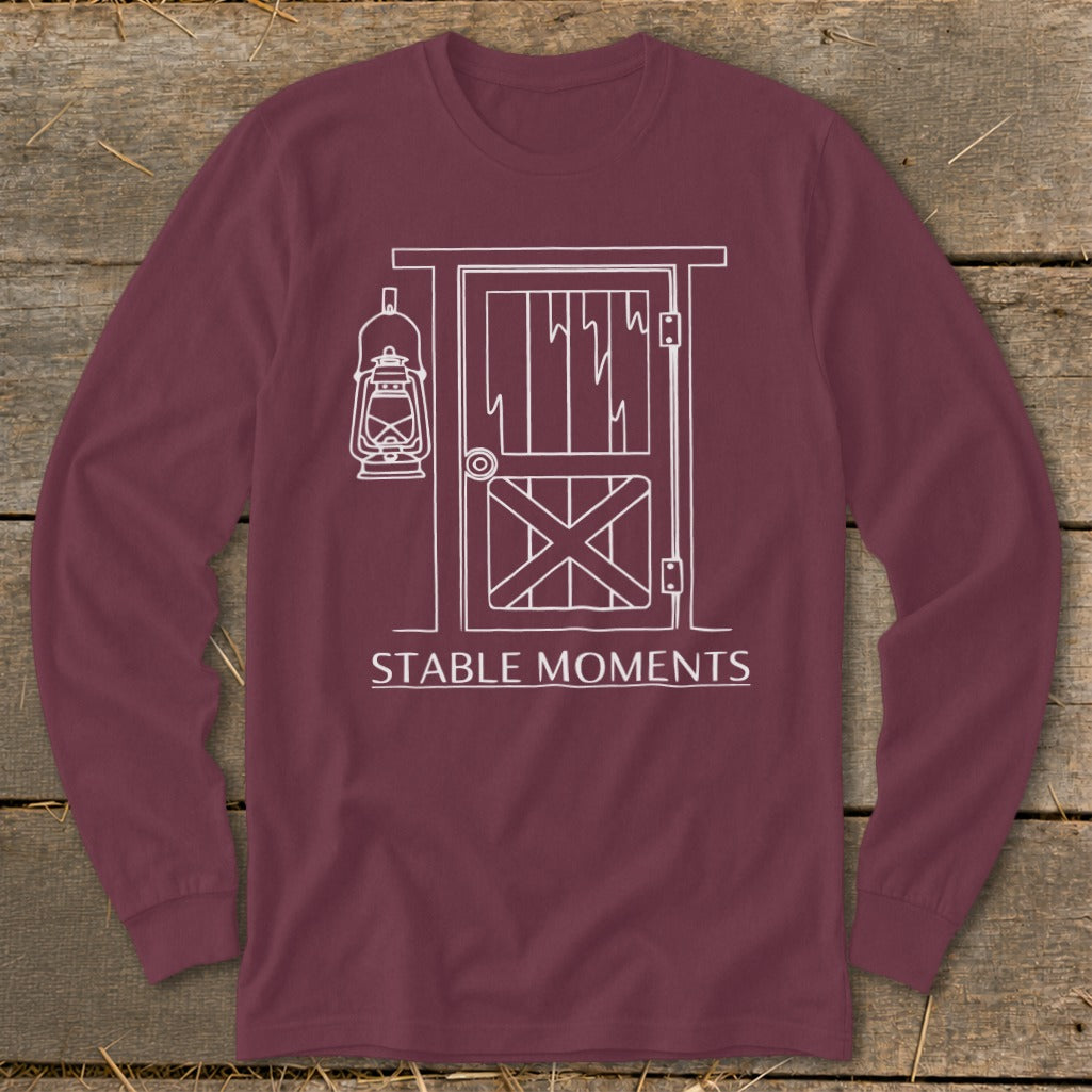 Maroon long-sleeve shirt with white line art of a barn door and lantern.
