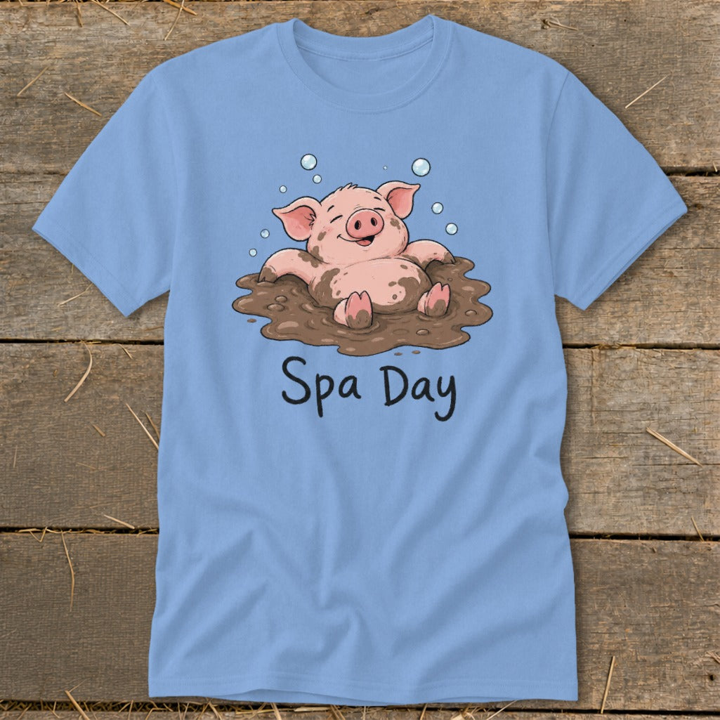 Light blue t-shirt with cartoon pig in mud and text "Spa Day".