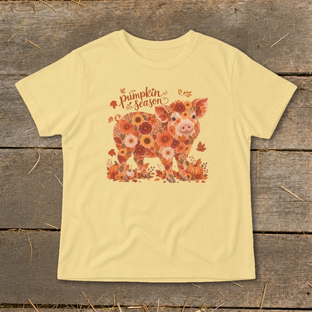 Yellow t-shirt with a floral pig graphic and "pumpkin season" text.