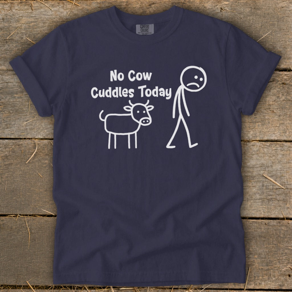 Navy t-shirt with white text and line art of a sad stick figure and a cow.