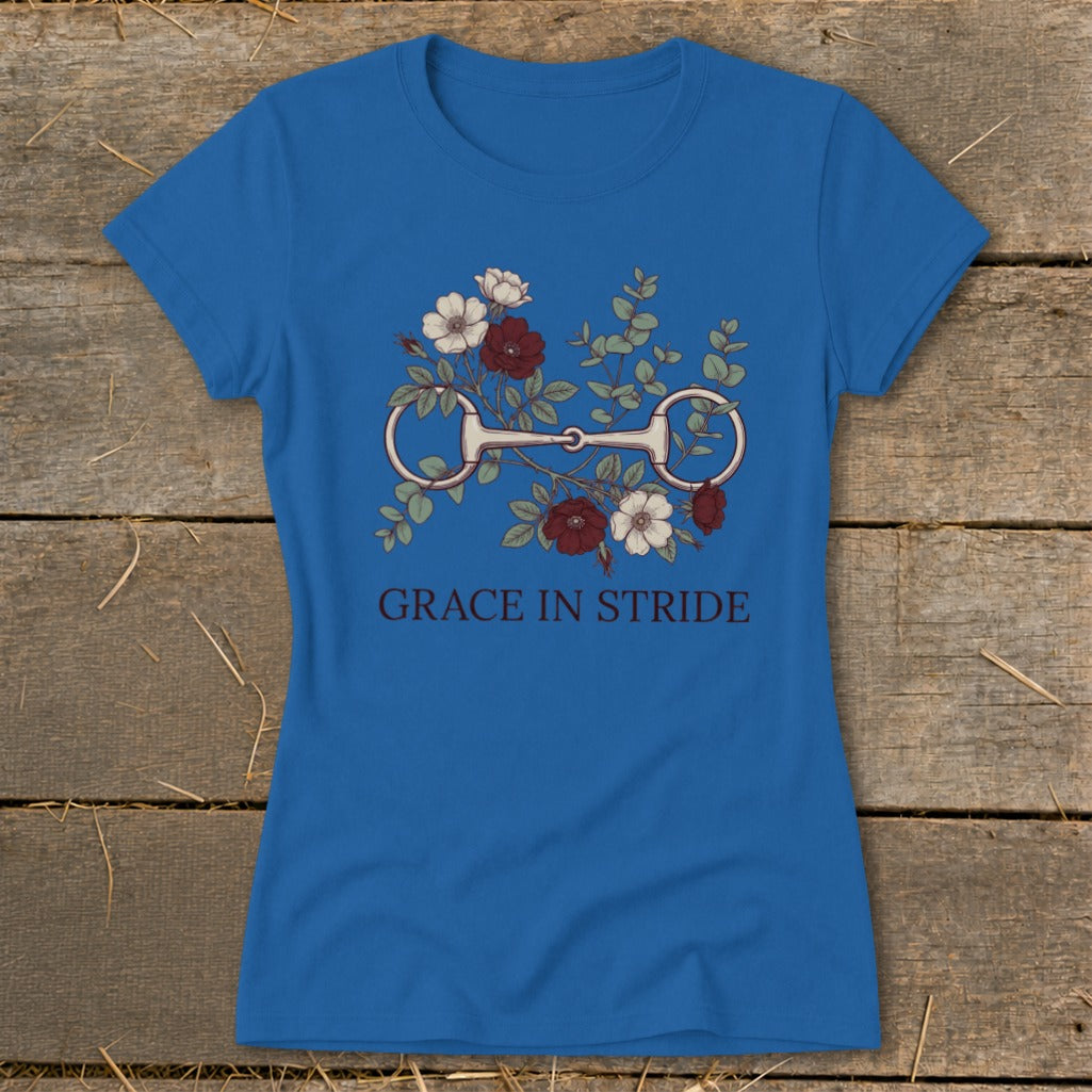 Blue t-shirt with horse bit and floral design, reading "GRACE IN STRIDE".