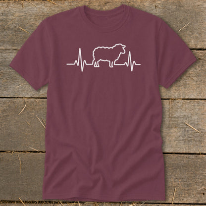 A maroon crewneck t-shirt featuring a white graphic of a sheep integrated into a heartbeat line.