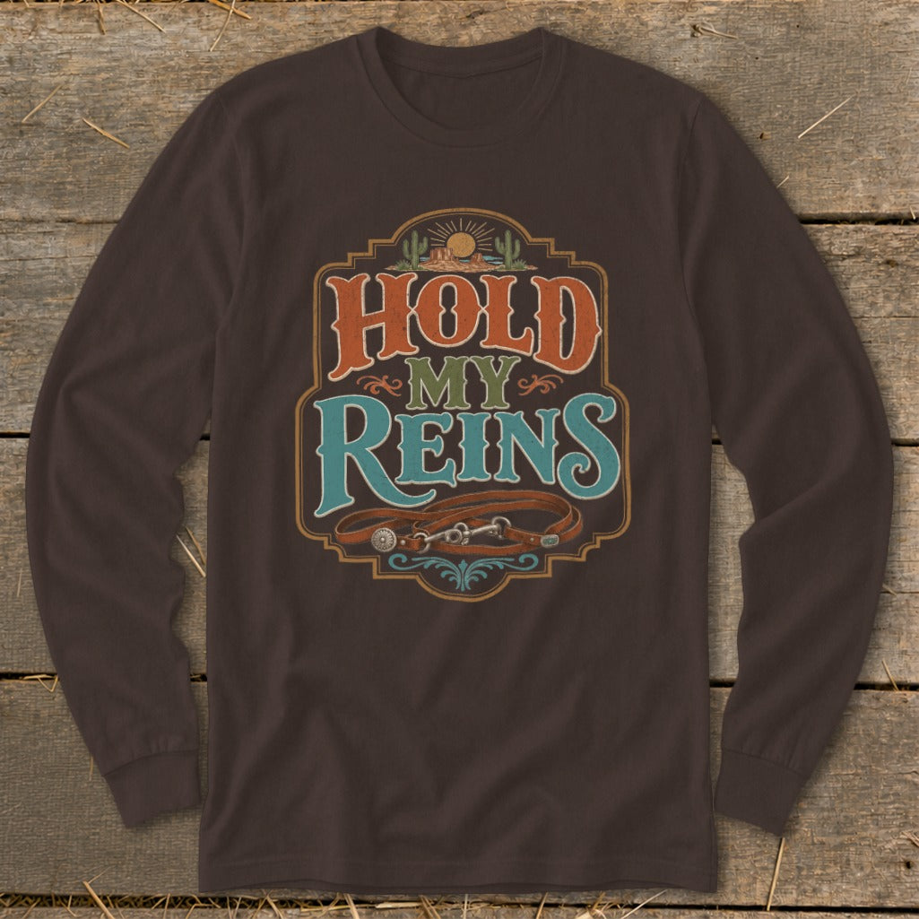 Brown long sleeve shirt with "Hold My Reins" text and horse tack graphic.