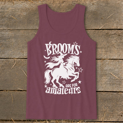 Maroon tank top with white graphic of witch riding a horse, reading "Brooms are for amateurs."