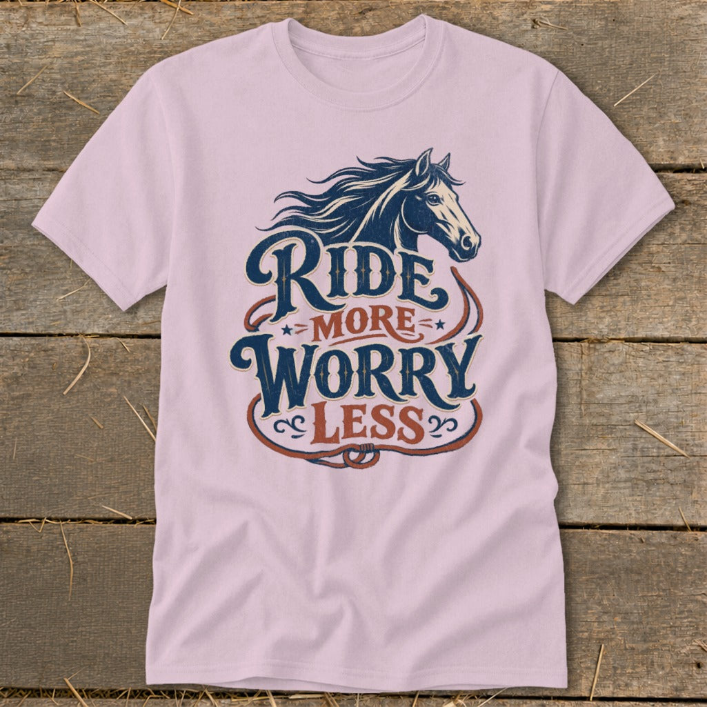 Pink t-shirt with "Ride More Worry Less" text and horse graphic.