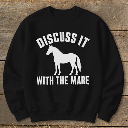 Black sweatshirt with white text "DISCUSS IT" above a horse silhouette and "WITH THE MARE".