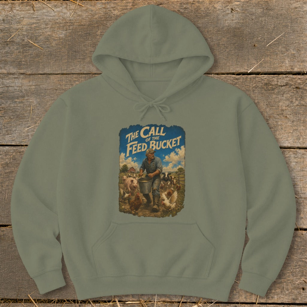 Green hoodie with graphic "The Call of the Feed Bucket" on farm scene.