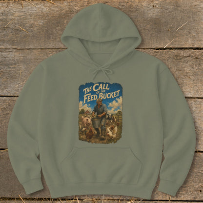 Green hoodie with graphic "The Call of the Feed Bucket" on farm scene.