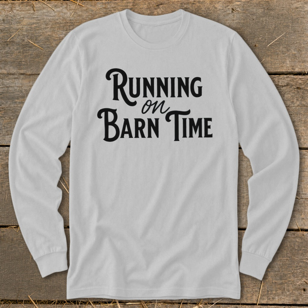 Light grey long-sleeve shirt with black text "Running on Barn Time".