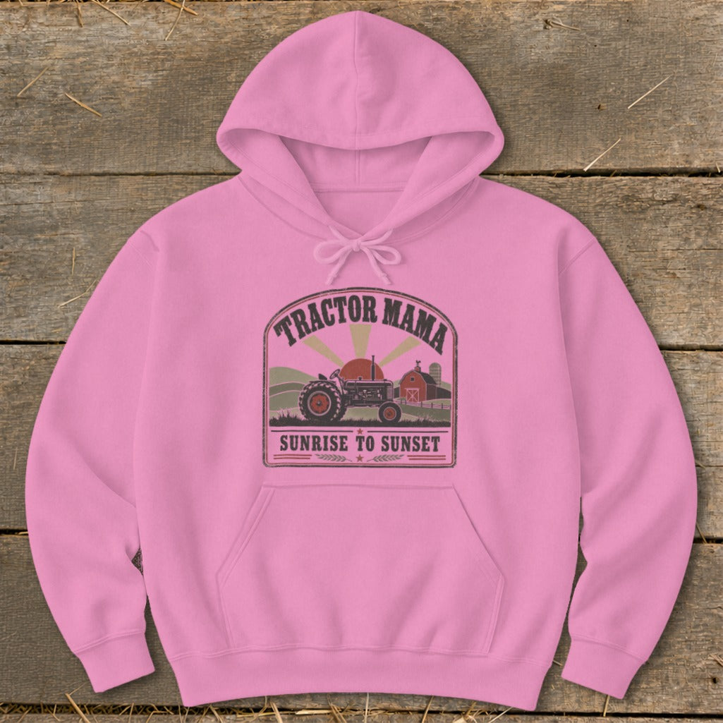 Pink hoodie with "Tractor Mama Sunrise To Sunset" graphic featuring a tractor and barn.