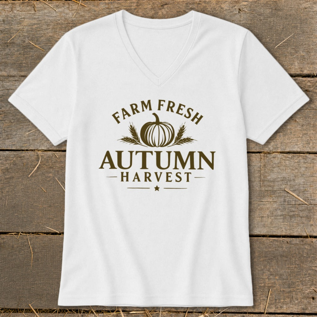 White V-neck t-shirt with brown text "FARM FRESH AUTUMN HARVEST" and pumpkin graphic.