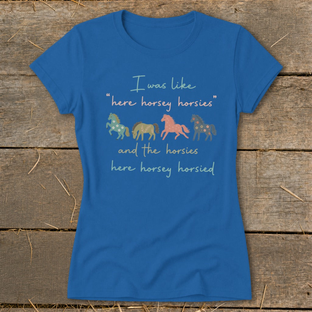 Blue t-shirt with text "I was like 'here horsey horsies'" and four illustrated horses.