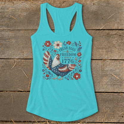 Turquoise tank top with a chicken and "Fresh Eggs & Freedom Since 1776" design.