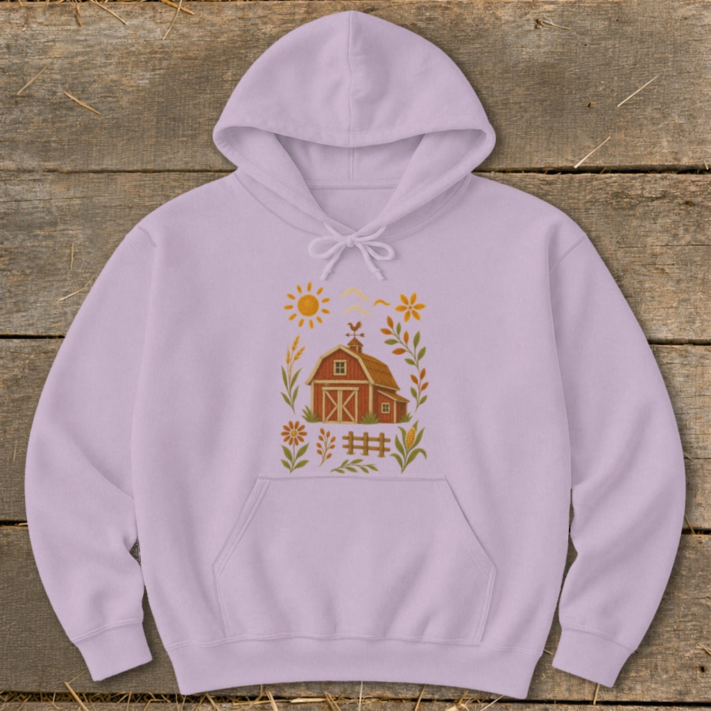 Lilac hoodie with a farm scene graphic featuring a barn, sun, flowers, and fence.