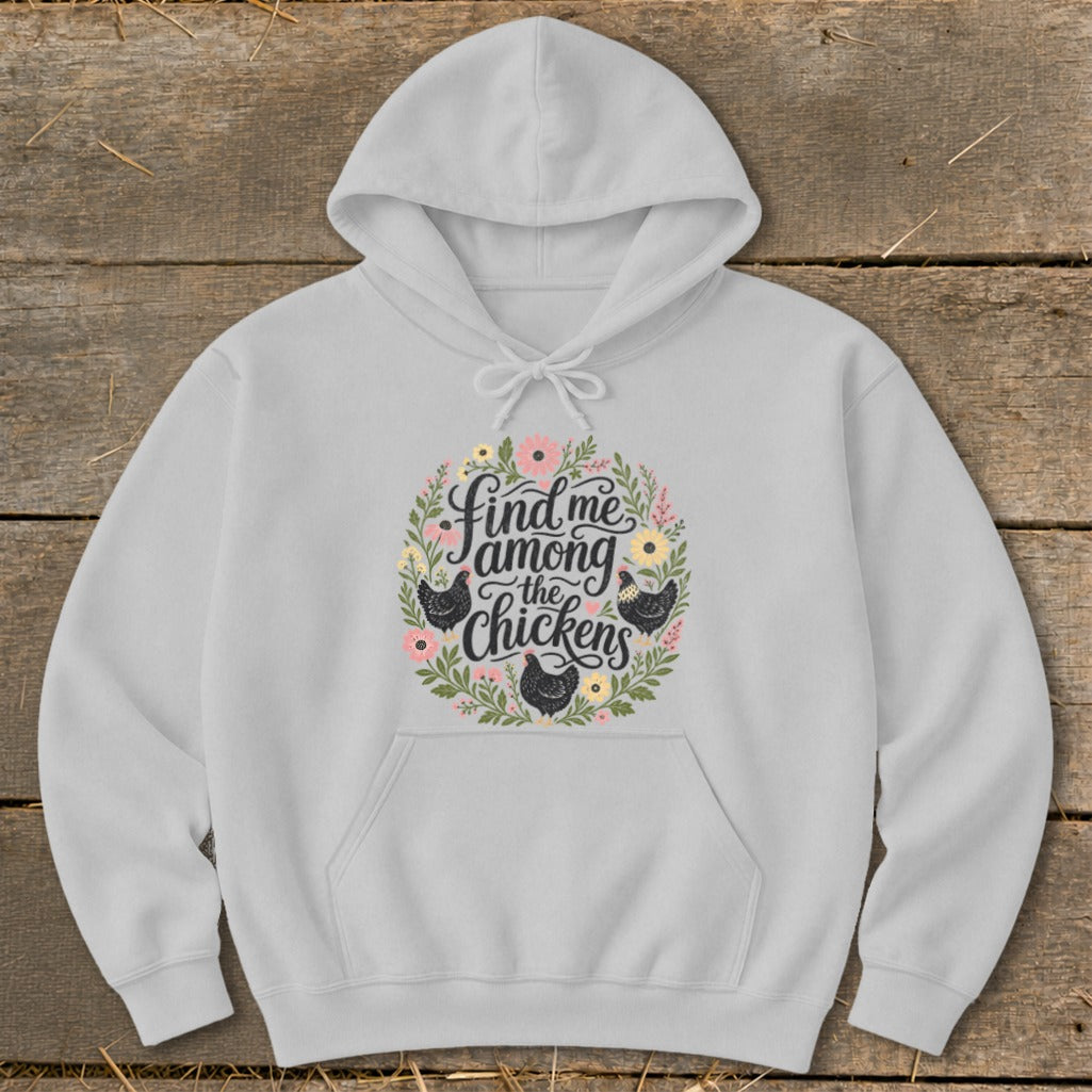 Light grey hoodie with a circular floral design and chickens, reading "Find me among the chickens."