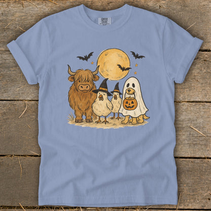 Halloween graphic of a Highland cow, chicks, and a dog in a ghost costume with a pumpkin.