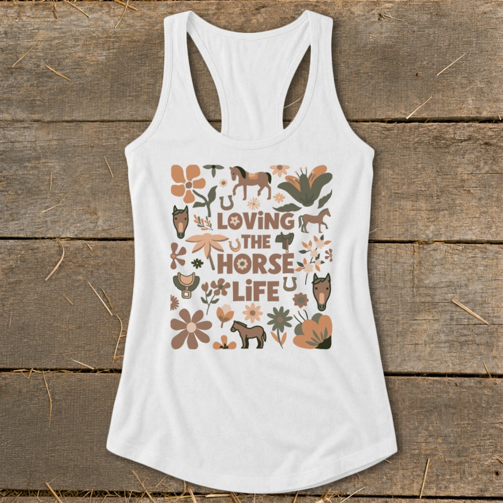 White tank top with "Loving the Horse Life" text and equestrian graphics.