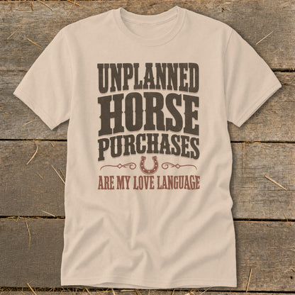 Unplanned horse purchases are my love language t-shirt with horseshoe graphic.