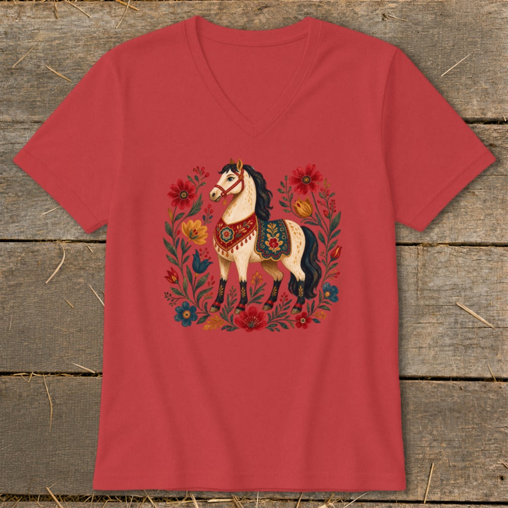 Red v-neck t-shirt with a cream horse surrounded by colorful flowers.