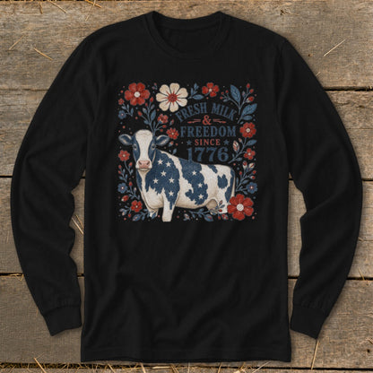 Black long-sleeve shirt with a cow graphic featuring stars and stripes and text.