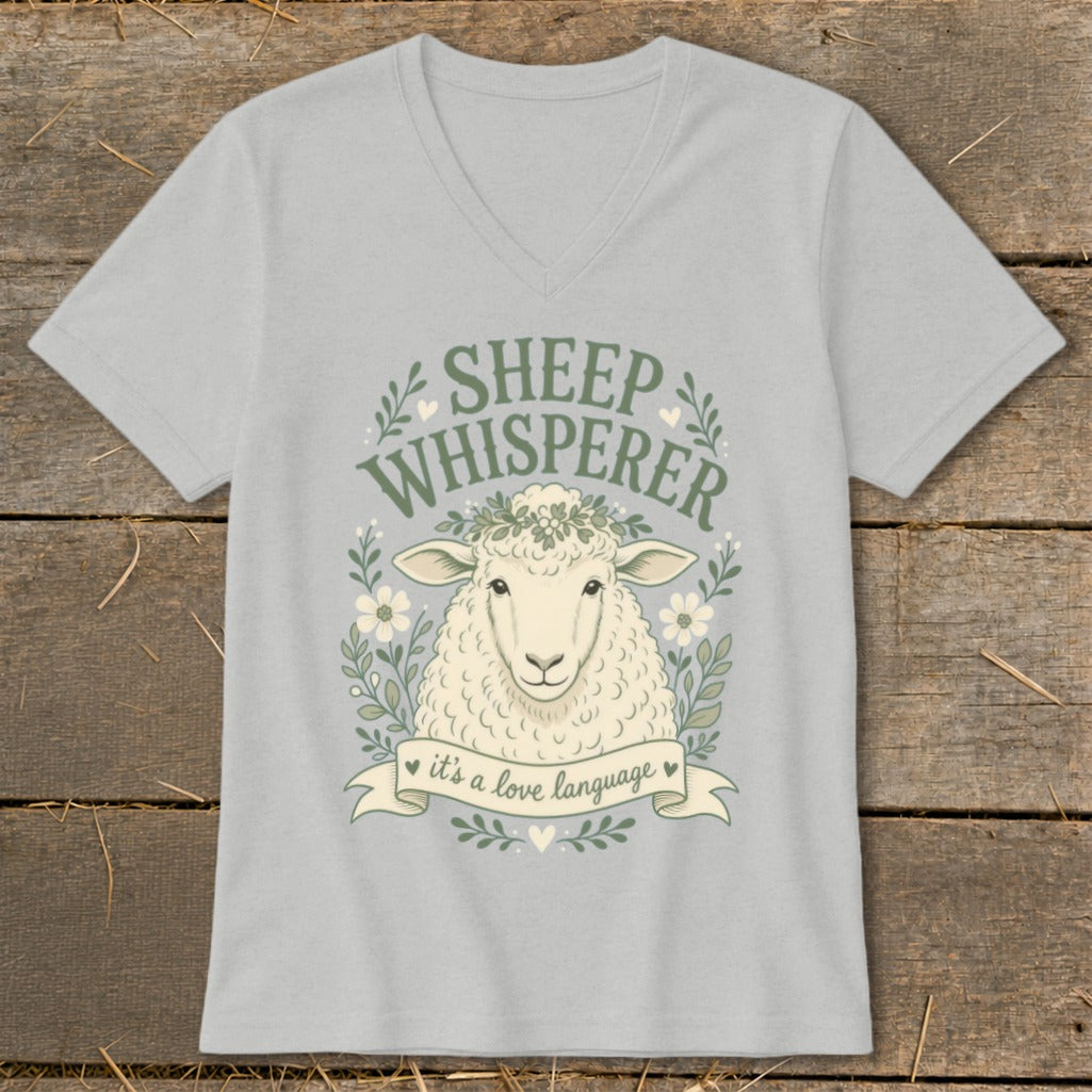 Light grey t-shirt with a sheep graphic and text that says "Sheep Whisperer".