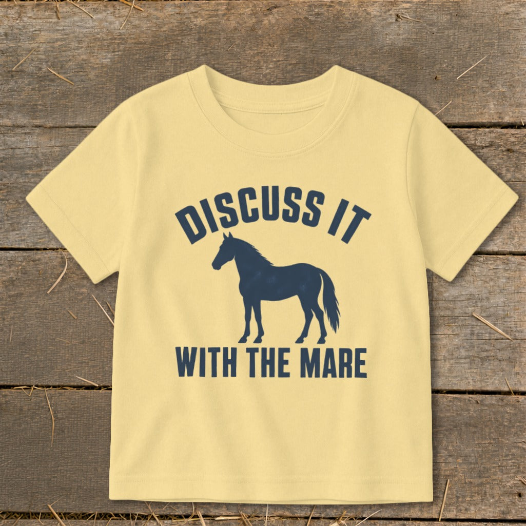 Yellow t-shirt with navy blue text and horse silhouette: "Discuss it with the mare."