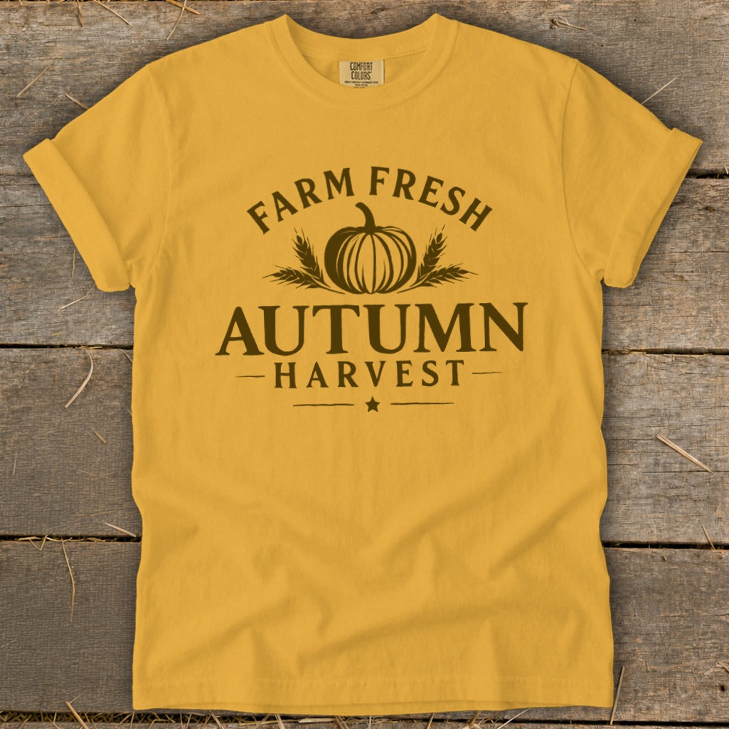 Yellow t-shirt with "Farm Fresh Autumn Harvest" text and a pumpkin graphic.