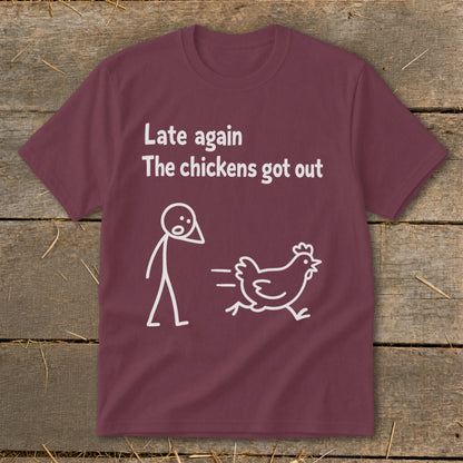 Maroon t-shirt with white text "Late again The chickens got out" and stick figure chasing a chicken.