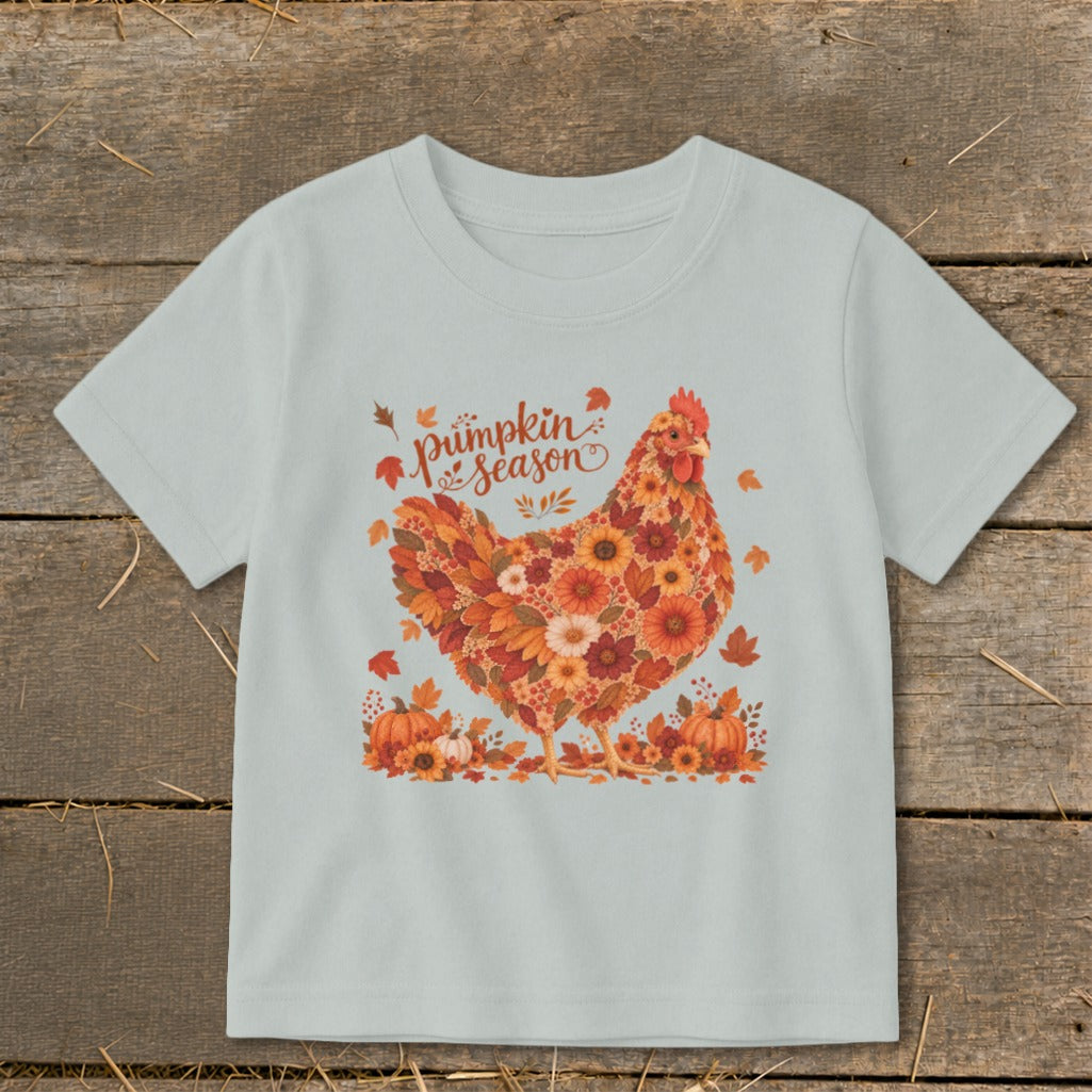 Light blue t-shirt with a chicken made of autumn flowers and text "pumpkin season".