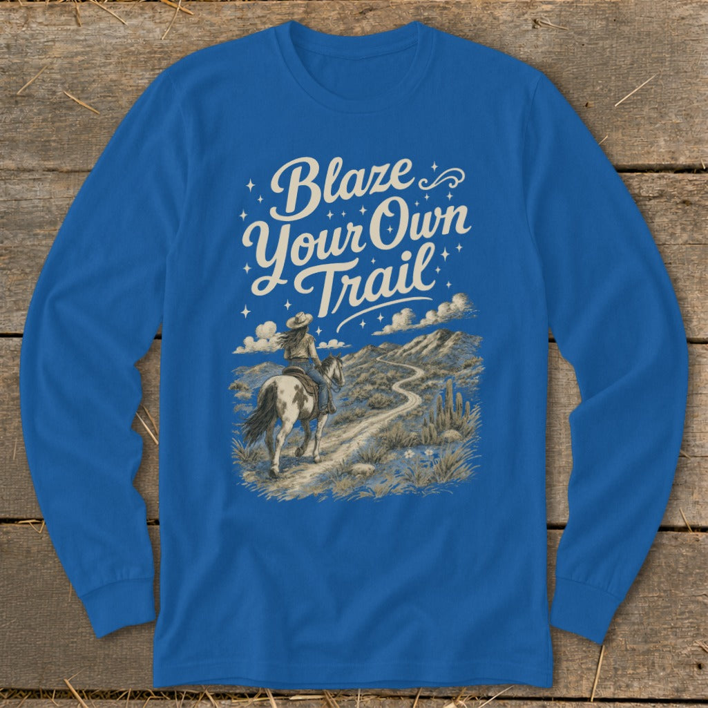 Long sleeve shirt with "Blaze Your Own Trail" text and a woman riding a horse.