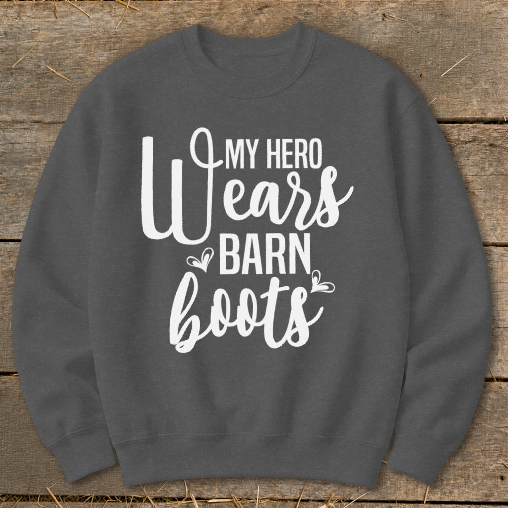 Dark gray sweatshirt with white text reading "My Hero Wears Barn Boots".