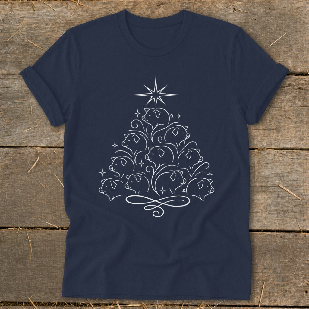 Navy t-shirt with a white line drawing of pigs forming a Christmas tree with a star.