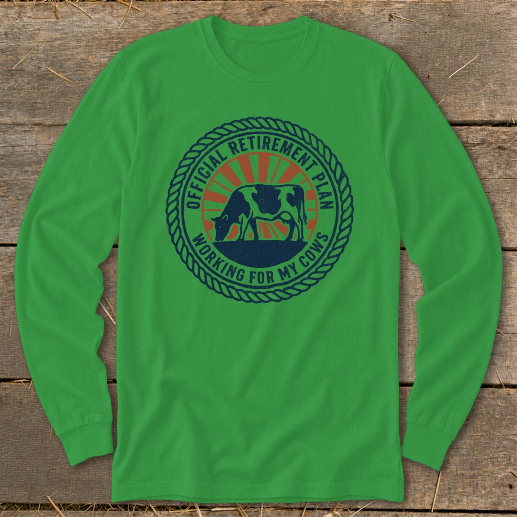 Green long-sleeve shirt with circular graphic of a cow and text "Official Retirement Plan Working For My Cows".