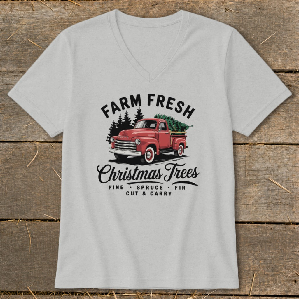 Graphic of a red vintage truck with a Christmas tree, text reads "Farm Fresh Christmas Trees".