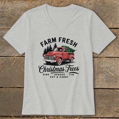 Graphic of a red vintage truck with a Christmas tree, text reads "Farm Fresh Christmas Trees".