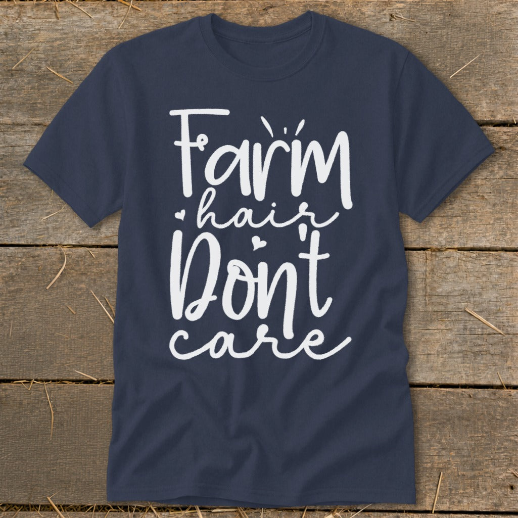 Navy t-shirt with white text reading "Farm hair Don't care".