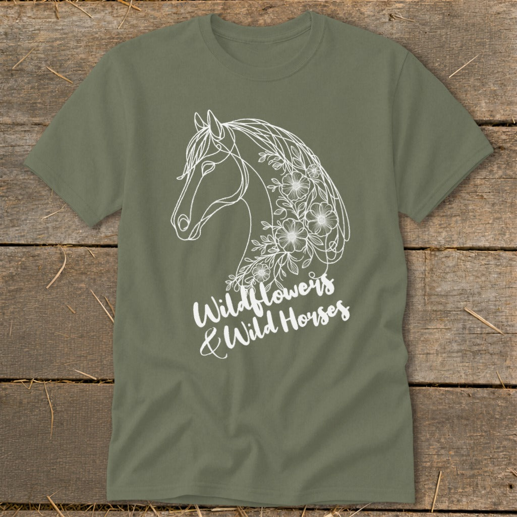 Olive green t-shirt with white line art of a horse's head surrounded by wildflowers and text.