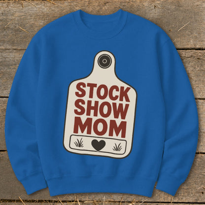 Blue sweatshirt with "STOCK SHOW MOM" text on a tag design.